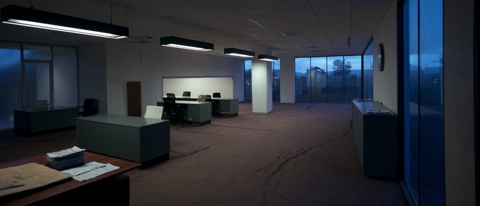 Empty open-plan office at dusk, cleaned and ready for the next working day