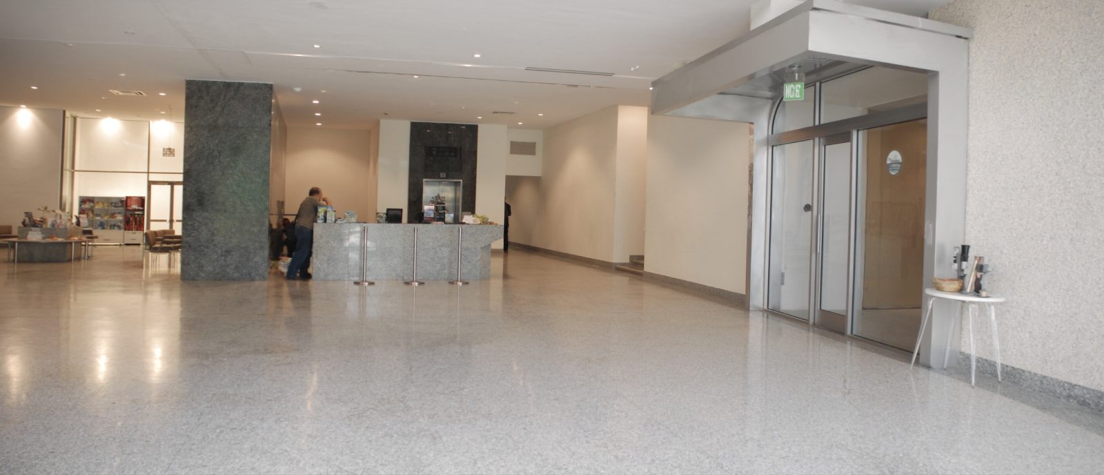 Mixed-use commercial building lobby at dusk